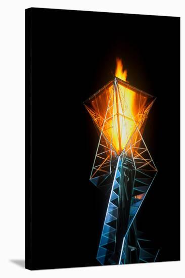 Olympic torch at night during the 2002 Winter Olympics, Salt Lake City, UT-null-Stretched Canvas