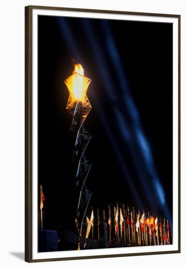Olympic torch at night during the 2002 Winter Olympics, Salt Lake City, UT-null-Framed Premium Photographic Print