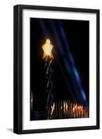 Olympic torch at night during the 2002 Winter Olympics, Salt Lake City, UT-null-Framed Photographic Print