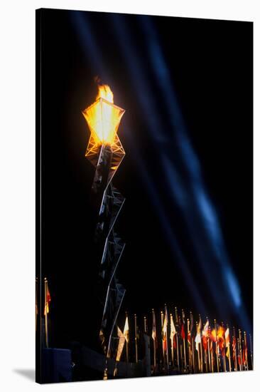 Olympic torch at night during the 2002 Winter Olympics, Salt Lake City, UT-null-Stretched Canvas