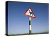 Oman, Dhofar Region, Salalah, Camel Crossing Sign in the Dhofar Mountains-Walter Bibikow-Stretched Canvas