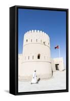 Oman, Sur. Omani Man Walking to the Entrance of Sunaysilah Old Fortress-Matteo Colombo-Framed Stretched Canvas