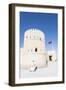 Oman, Sur. Omani Man Walking to the Entrance of Sunaysilah Old Fortress-Matteo Colombo-Framed Photographic Print
