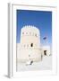 Oman, Sur. Omani Man Walking to the Entrance of Sunaysilah Old Fortress-Matteo Colombo-Framed Photographic Print