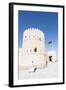 Oman, Sur. Omani Man Walking to the Entrance of Sunaysilah Old Fortress-Matteo Colombo-Framed Photographic Print