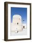 Oman, Sur. Omani Man Walking to the Entrance of Sunaysilah Old Fortress-Matteo Colombo-Framed Photographic Print