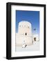 Oman, Sur. Omani Man Walking to the Entrance of Sunaysilah Old Fortress-Matteo Colombo-Framed Photographic Print