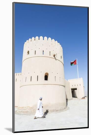 Oman, Sur. Omani Man Walking to the Entrance of Sunaysilah Old Fortress-Matteo Colombo-Mounted Photographic Print