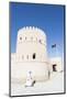 Oman, Sur. Omani Man Walking to the Entrance of Sunaysilah Old Fortress-Matteo Colombo-Mounted Photographic Print