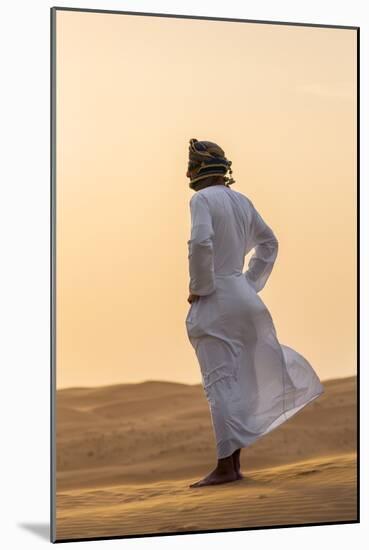 Oman, Wahiba Sands. an Omani Guide Enjoys the Sunset on Sand Dunes in Wahiba Sands.-Nigel Pavitt-Mounted Photographic Print