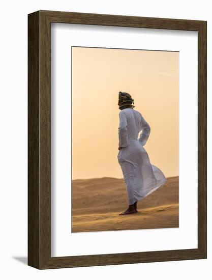 Oman, Wahiba Sands. an Omani Guide Enjoys the Sunset on Sand Dunes in Wahiba Sands.-Nigel Pavitt-Framed Photographic Print