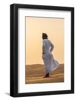 Oman, Wahiba Sands. an Omani Guide Enjoys the Sunset on Sand Dunes in Wahiba Sands.-Nigel Pavitt-Framed Photographic Print