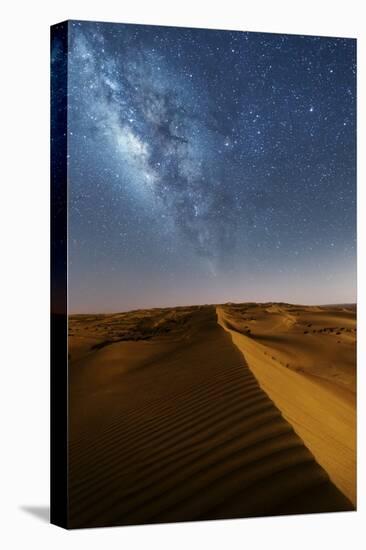 Oman, Wahiba Sands. the Sand Dunes at Night Lit by the Moon with the Milky Way-Matteo Colombo-Stretched Canvas