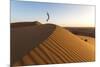 Oman, Wahiba Sands. Tourist Jumping on the Sand Dunes (Mr)-Matteo Colombo-Mounted Photographic Print