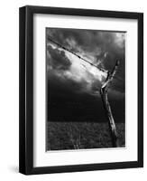 On a Small Farm, Ominous Clouds Overhead, Outlined by Barbed Wire Fencing-Nat Farbman-Framed Photographic Print