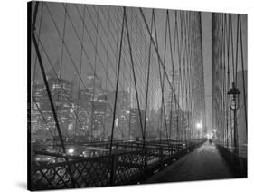 On Brooklyn Bridge by night, NYC-Michel Setboun-Stretched Canvas