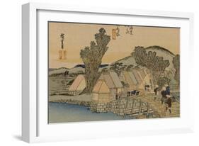 On the Bridge Two Servants Carrying a Covered Carrying Case-Utagawa Hiroshige-Framed Art Print