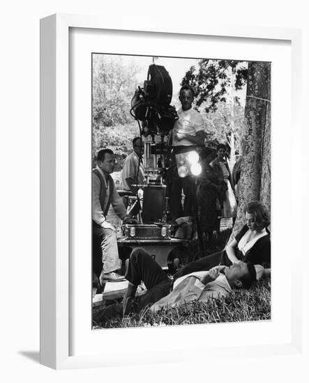 On the set of film ROCCO and SES FRERES, Luchino Visconti directs Renato Salvatori and Annie Girard-null-Framed Photo