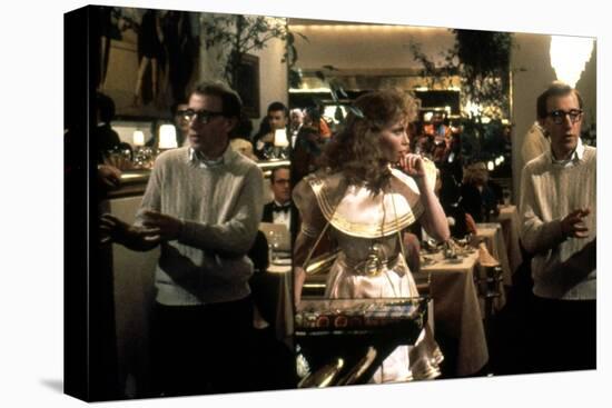 On the set, Woody Allen directs Mia Farrow. RADIO DAYS, 1987 directed by Woody Allen (photo)-null-Stretched Canvas