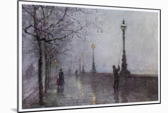 On the Thames Embankment - the Lamplighter Lights the Last of the Gas Lamps-null-Mounted Art Print