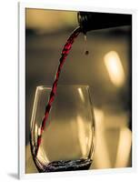 One drop shows as red wine is poured into glass.-Richard Duval-Framed Photographic Print