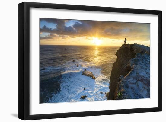 One man watching sunrise over the ocean waves from cliffs, Madeira island, Portugal, Atlantic-Roberto Moiola-Framed Photographic Print