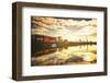 One of Main River's side channels with stacked containers and golden reflections in an industrial s-Andreas Brandl-Framed Photographic Print