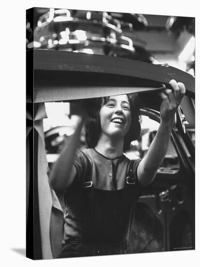 One of the 12% of Women Working on the Assembly Line of a Volkswagen Plant-Paul Schutzer-Stretched Canvas