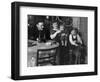 One Year Old Baby Boy Gets a Drink of Coca Cola in Front of the Christmas Tree, Ca. 1946-null-Framed Photographic Print