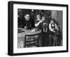 One Year Old Baby Boy Gets a Drink of Coca Cola in Front of the Christmas Tree, Ca. 1946-null-Framed Photographic Print