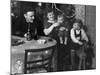 One Year Old Baby Boy Gets a Drink of Coca Cola in Front of the Christmas Tree, Ca. 1946-null-Mounted Photographic Print