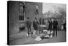 Onlookers Watch as Suited Men Stand in Front of a Large Copper Kettle for Making Illegal Liquor-null-Stretched Canvas