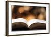 Open Book on Wooden Table with Bokeh Effect in the Background-Chris_Elwell-Framed Photographic Print