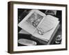 Open Pages of an Old Book, Held Down by a Pair of Steel-Rimmed Spectacles at Mt. Pleasant-null-Framed Photographic Print