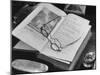 Open Pages of an Old Book, Held Down by a Pair of Steel-Rimmed Spectacles at Mt. Pleasant-null-Mounted Photographic Print