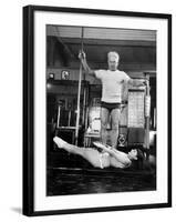 Opera Singer Roberta Peters Balancing Her Trainer, Joseph Pilates, on Her Operatic Breadbasket-Michael Rougier-Framed Premium Photographic Print