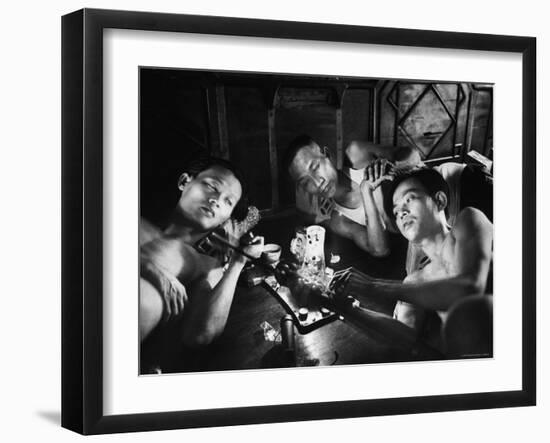 Opium Addicts Smoking, Sleeping, and Talking Together in a Desentoxication Clinic-Jack Birns-Framed Photographic Print