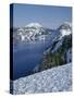 OR, Crater Lake NP. Evening light warms snowy rim of Crater Lake in late afternoon-John Barger-Stretched Canvas