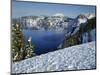 OR, Crater Lake NP. Evening light warms snowy rim of Crater Lake in late afternoon-John Barger-Mounted Photographic Print