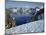 OR, Crater Lake NP. Evening light warms snowy rim of Crater Lake in late afternoon-John Barger-Mounted Photographic Print