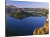 OR, Crater Lake NP. Sunrise light on Wizard Island, view south from Merriam Point-John Barger-Stretched Canvas