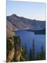 OR, Crater Lake NP. Sunrise on west rim of Crater Lake with Hillman Peak overlooking Wizard Island.-John Barger-Mounted Photographic Print