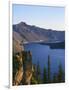 OR, Crater Lake NP. Sunrise on west rim of Crater Lake with Hillman Peak overlooking Wizard Island.-John Barger-Framed Photographic Print