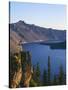 OR, Crater Lake NP. Sunrise on west rim of Crater Lake with Hillman Peak overlooking Wizard Island.-John Barger-Stretched Canvas