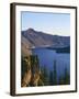 OR, Crater Lake NP. Sunrise on west rim of Crater Lake with Hillman Peak overlooking Wizard Island.-John Barger-Framed Photographic Print