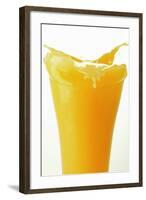 Orange Juice Splashing Out of Glass-Foodcollection-Framed Photographic Print