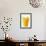 Orange Juice Splashing Out of Glass-Foodcollection-Framed Photographic Print displayed on a wall