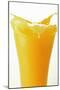 Orange Juice Splashing Out of Glass-Foodcollection-Mounted Photographic Print