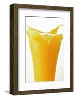 Orange Juice Splashing Out of Glass-Foodcollection-Framed Photographic Print