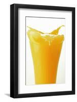 Orange Juice Splashing Out of Glass-Foodcollection-Framed Photographic Print